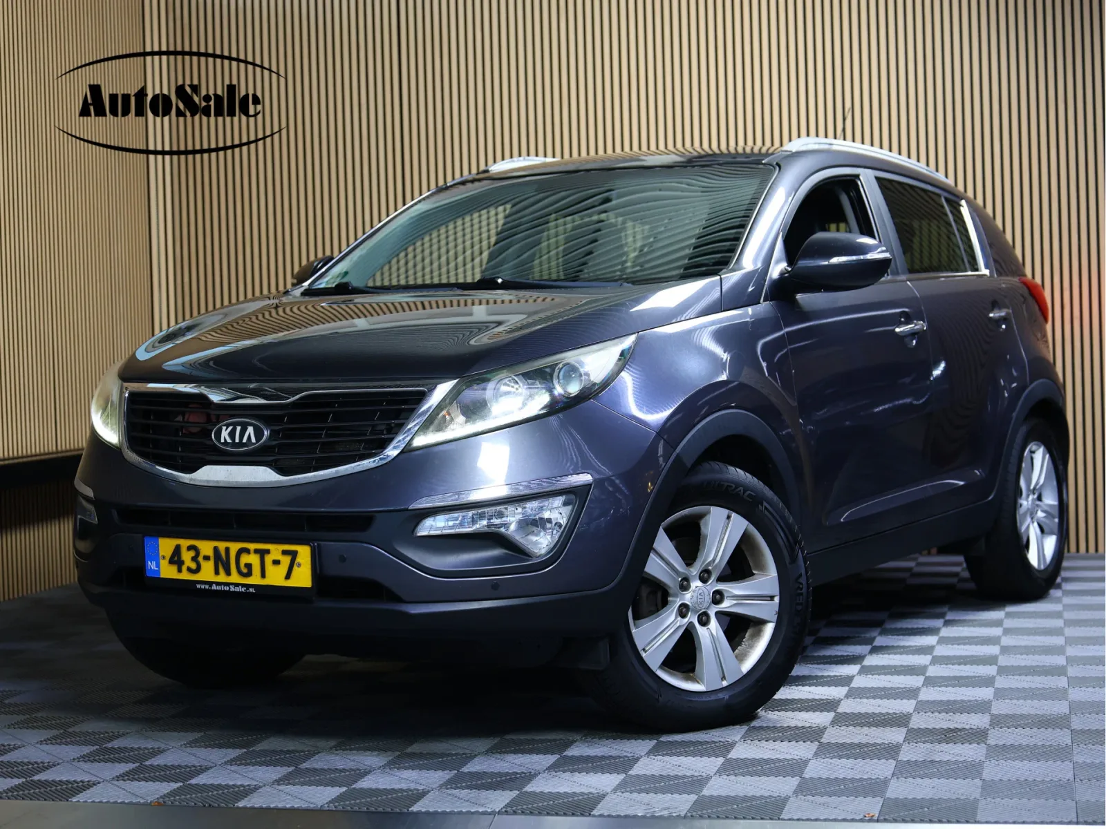 Kia Sportage (2010) — foto 1