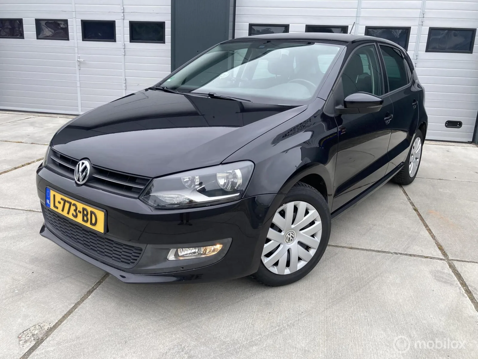 Volkswagen Polo (2011) — foto 1