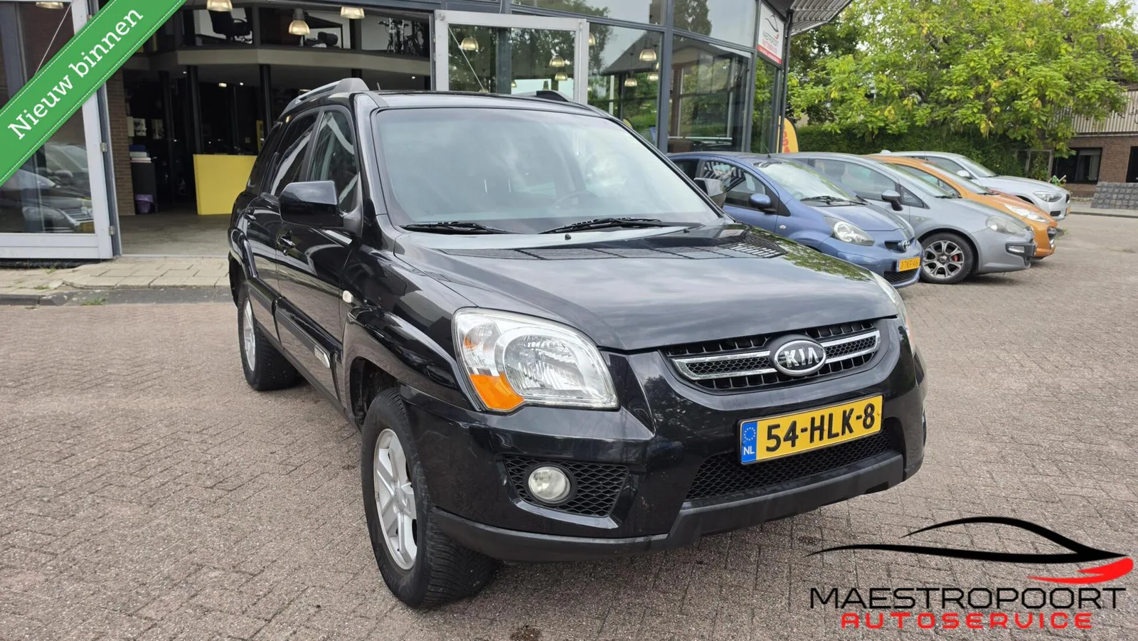 Kia Sportage (2009) — foto 1