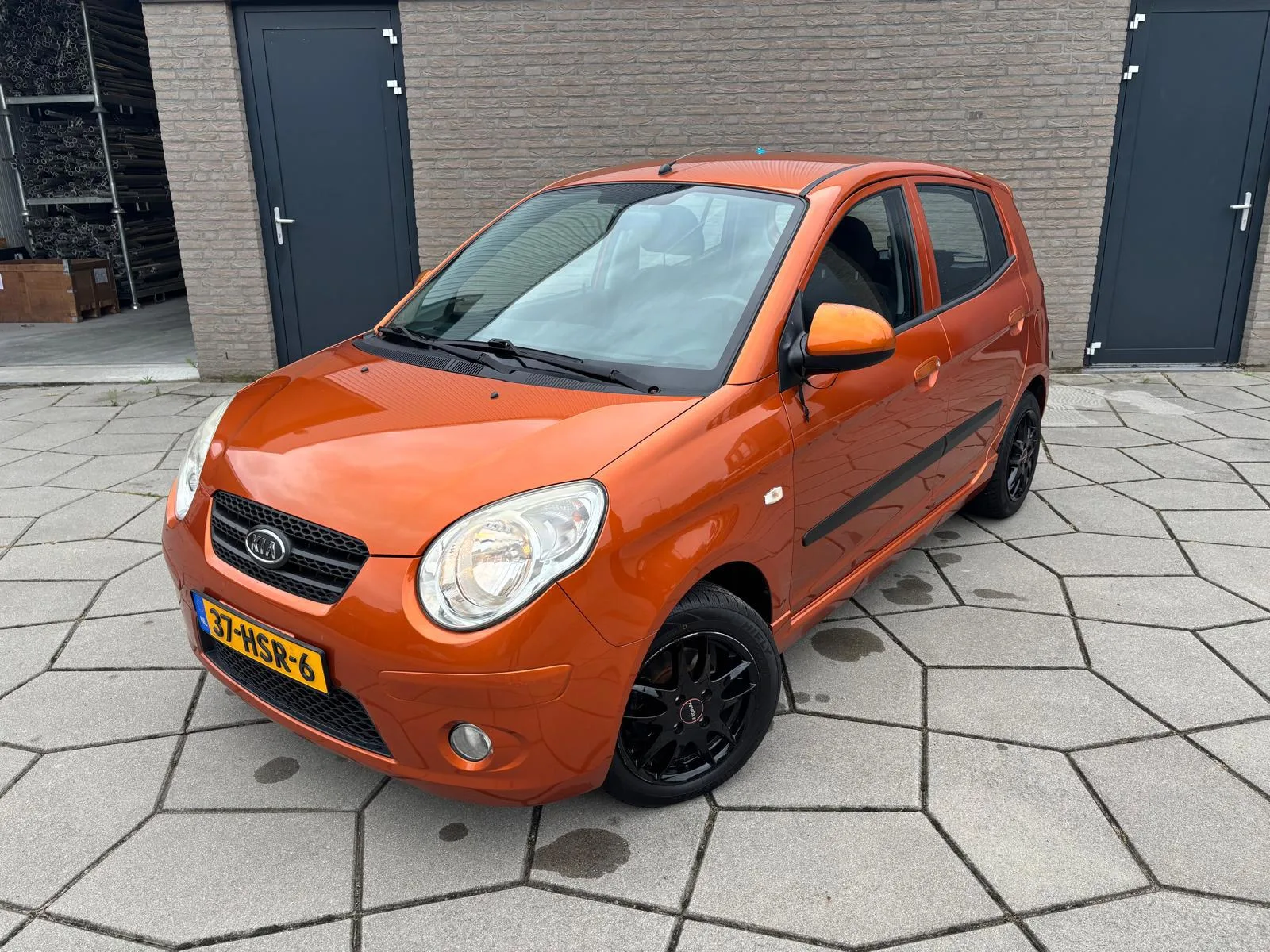 Kia Picanto (2009) — foto 1