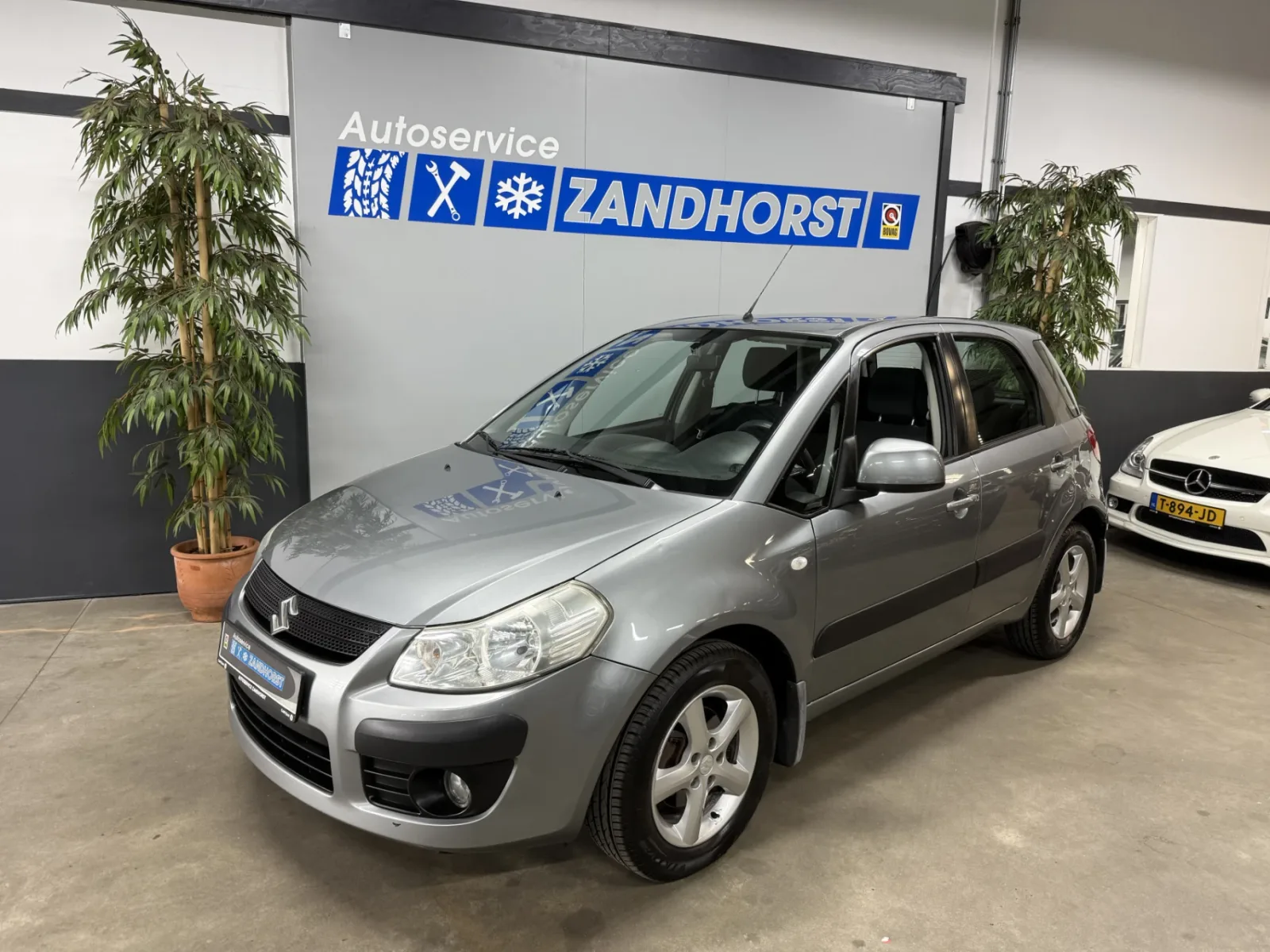 Suzuki SX4 (2006) — foto 1