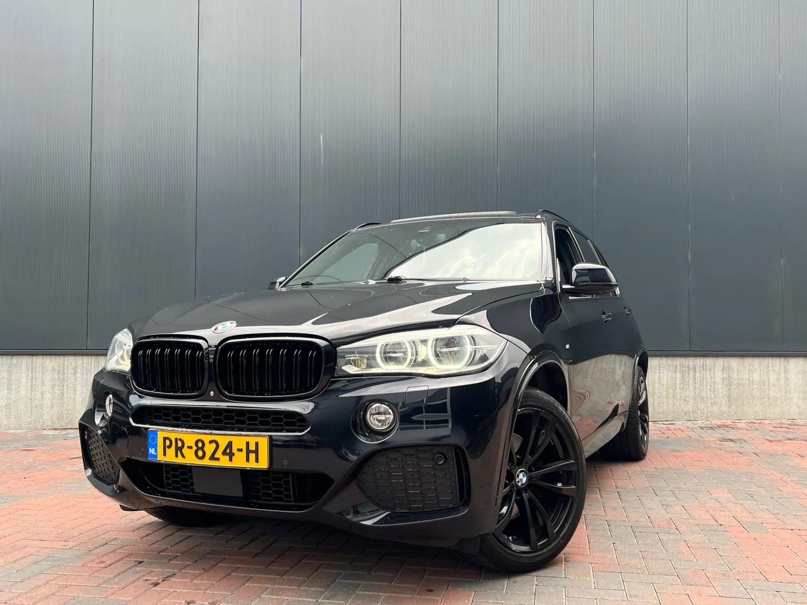 BMW X5 (2014) — foto 1