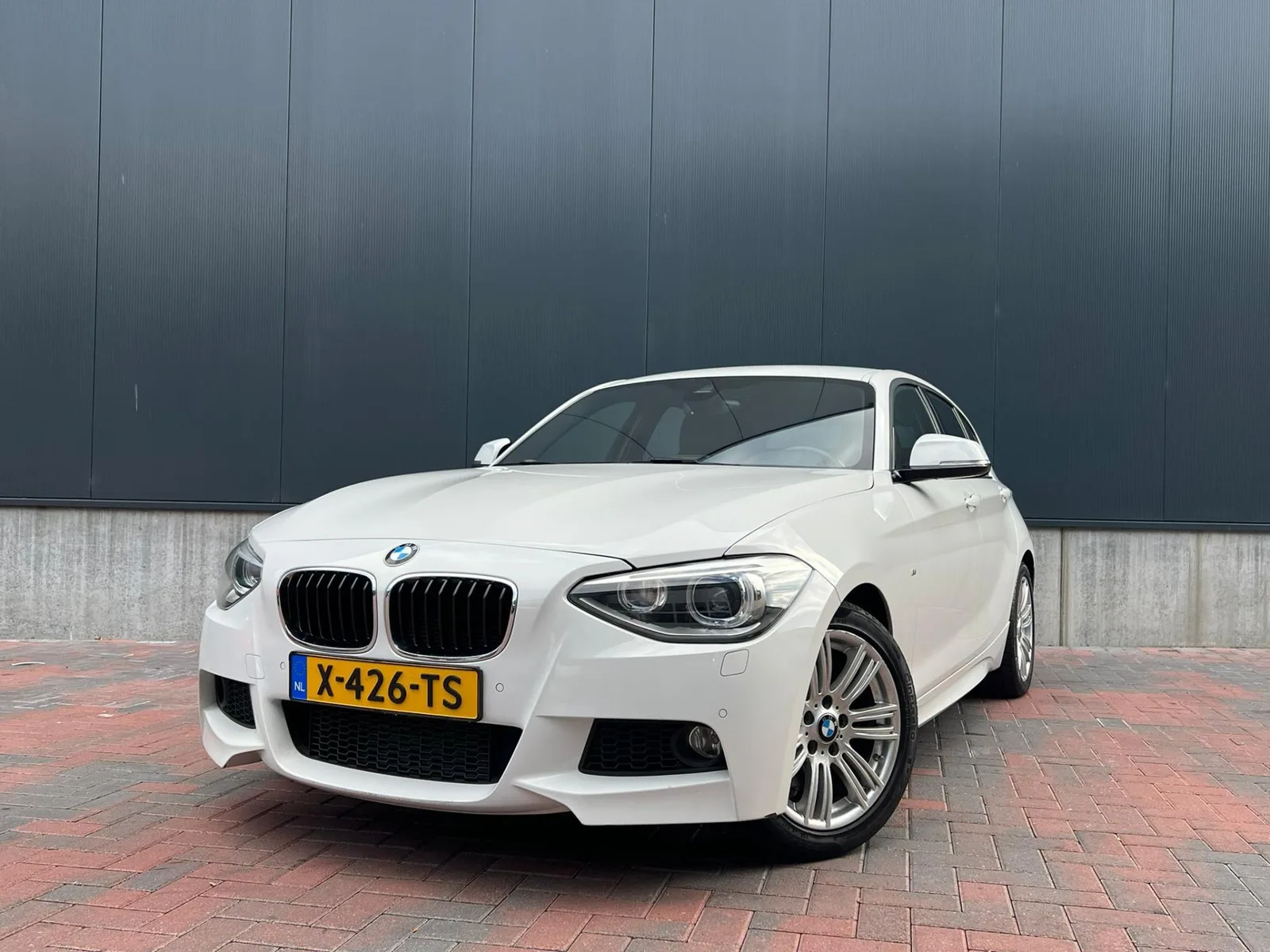 BMW 1-Serie (2014) — foto 1