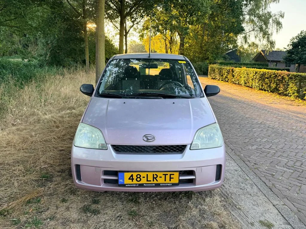 Daihatsu Cuore (2003) — foto 1
