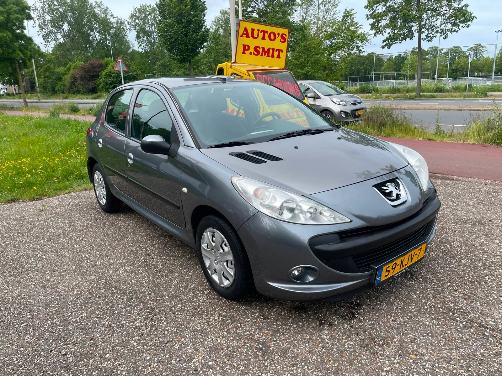 Peugeot 206 (2010) — foto 1
