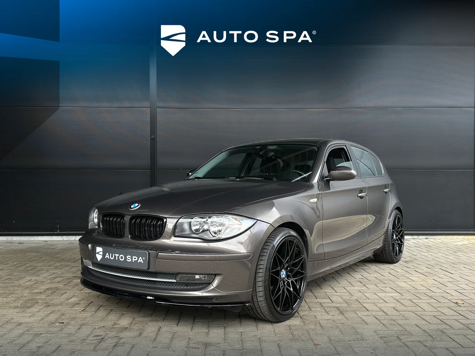 BMW 1-Serie (2009) — foto 1