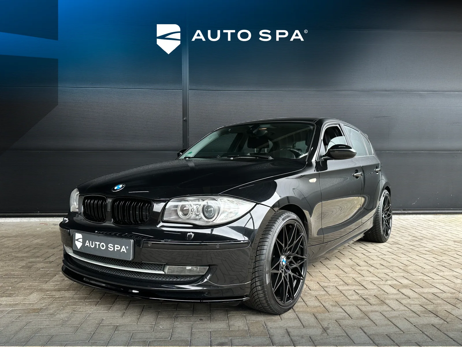 BMW 1-Serie (2009) — foto 1