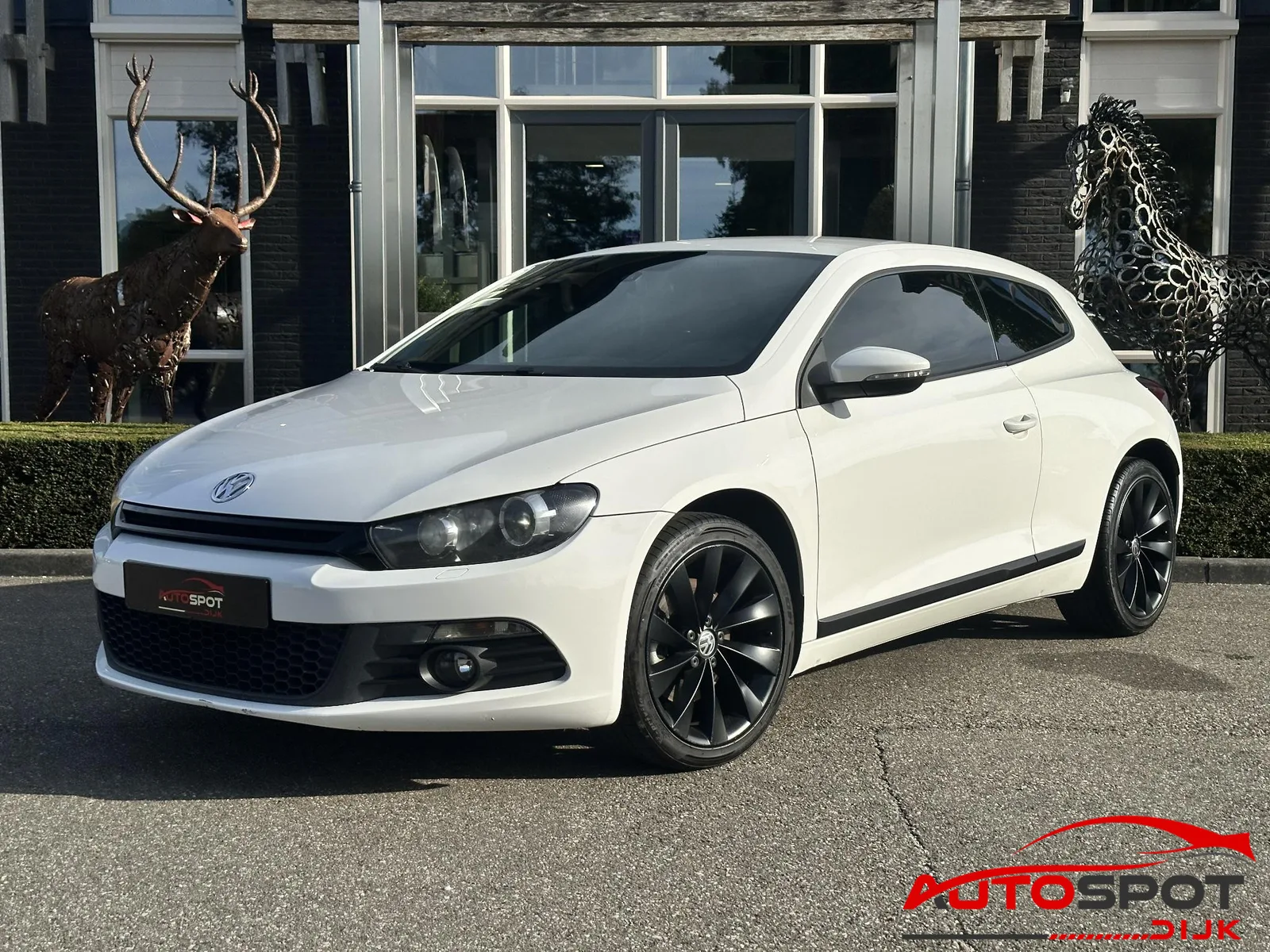 Volkswagen Scirocco (2009) — foto 1
