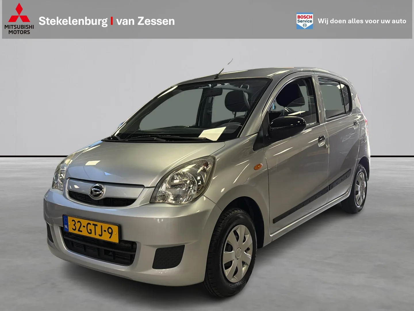 Daihatsu Cuore (2008) — foto 1