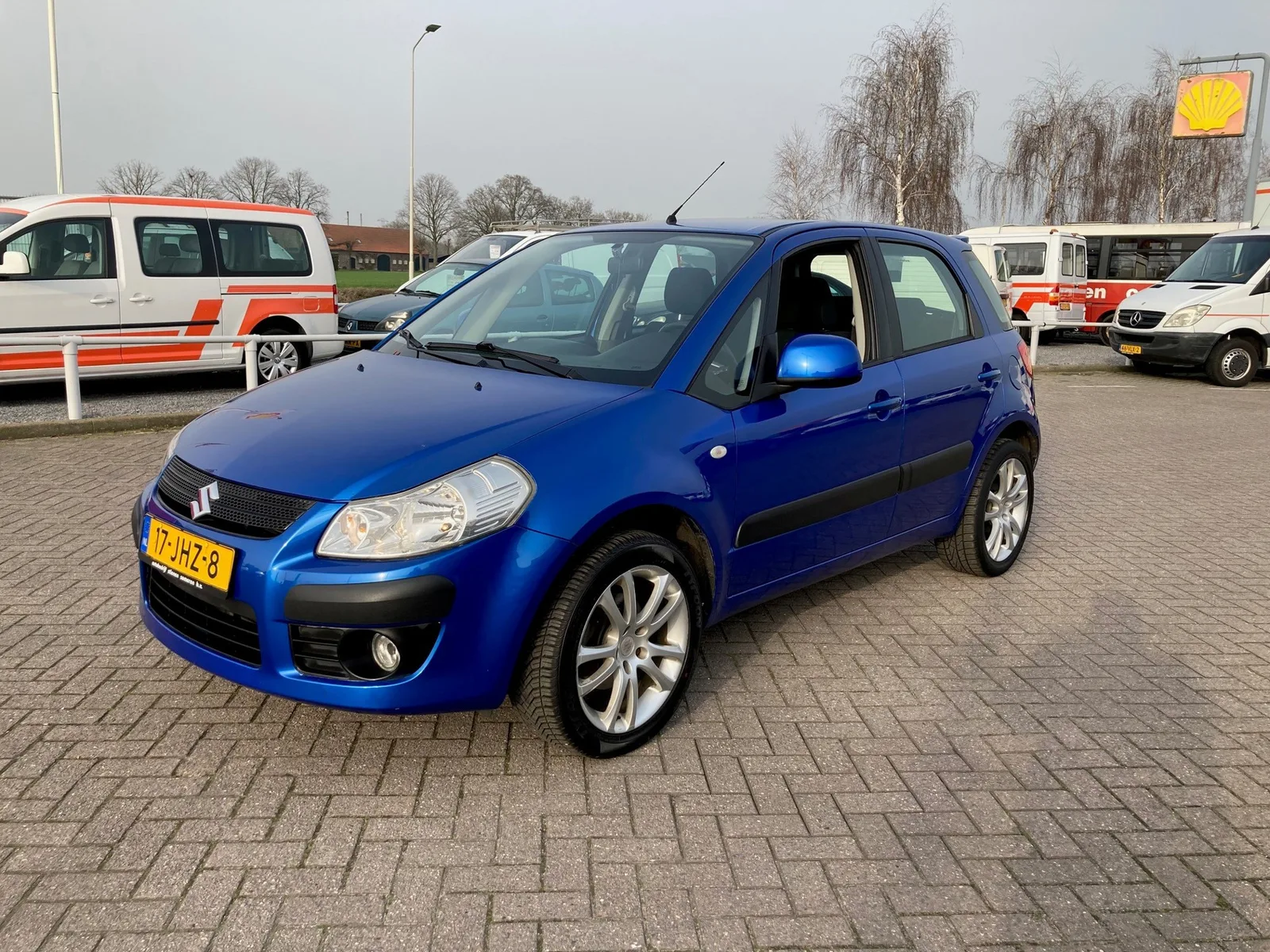 Suzuki SX4 (2009) — foto 1