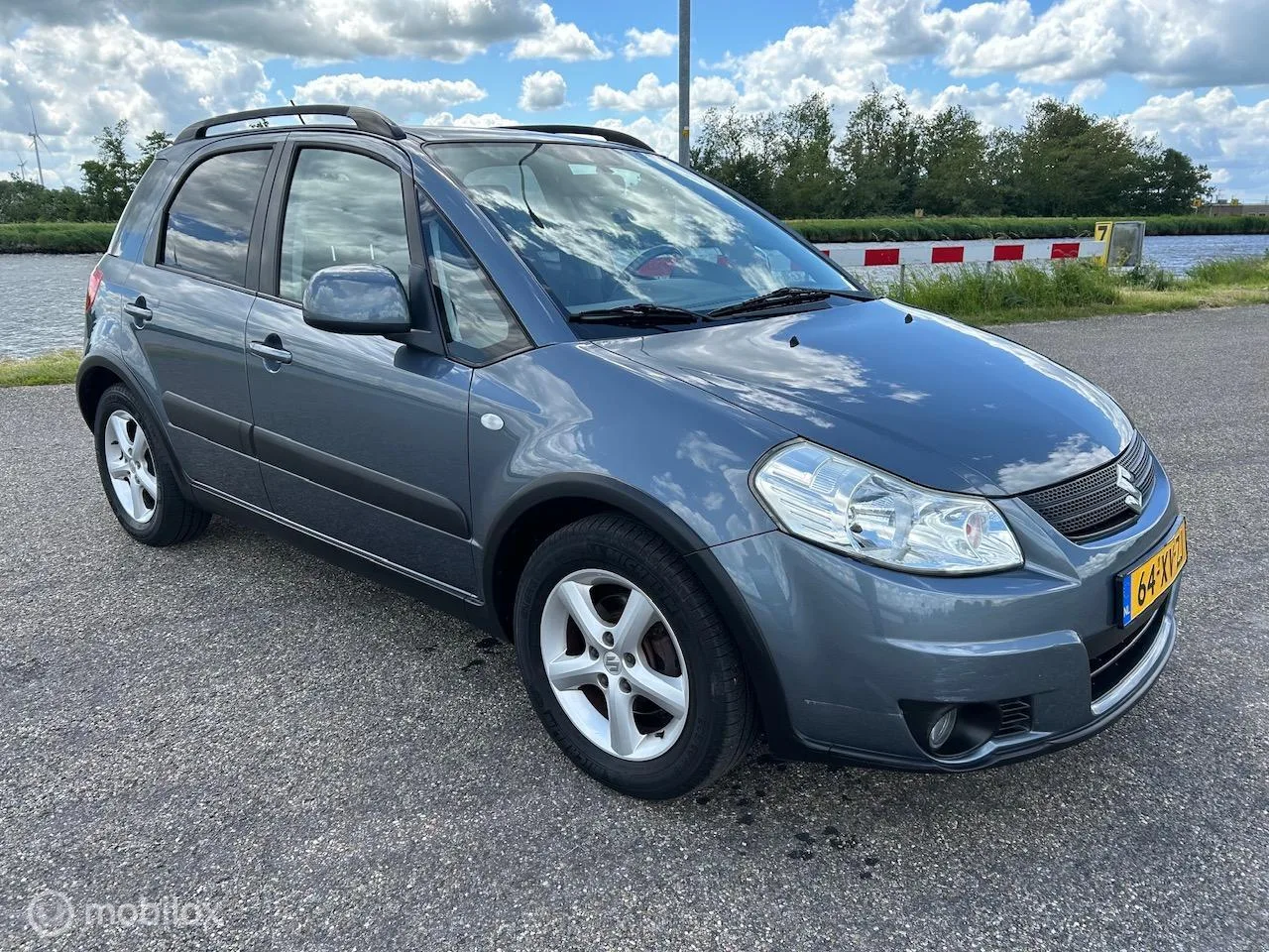Suzuki SX4 (2007) — foto 1