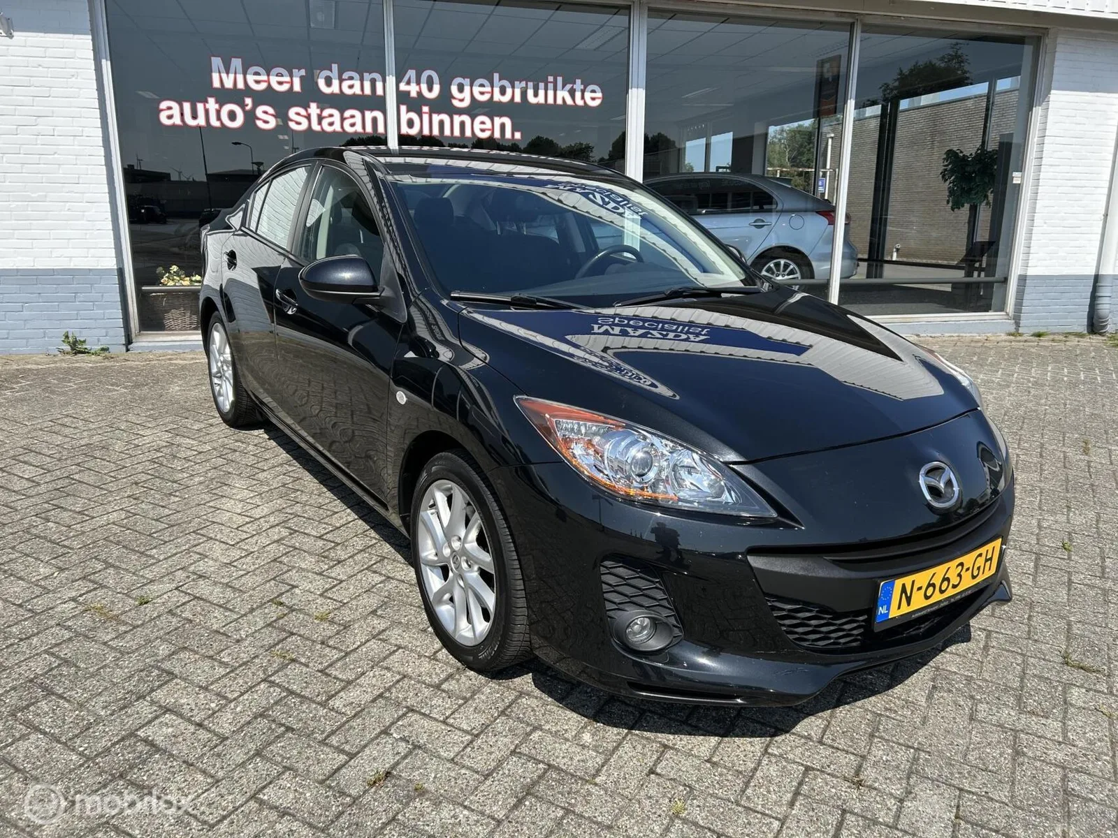 Mazda 3 (2011) — foto 1