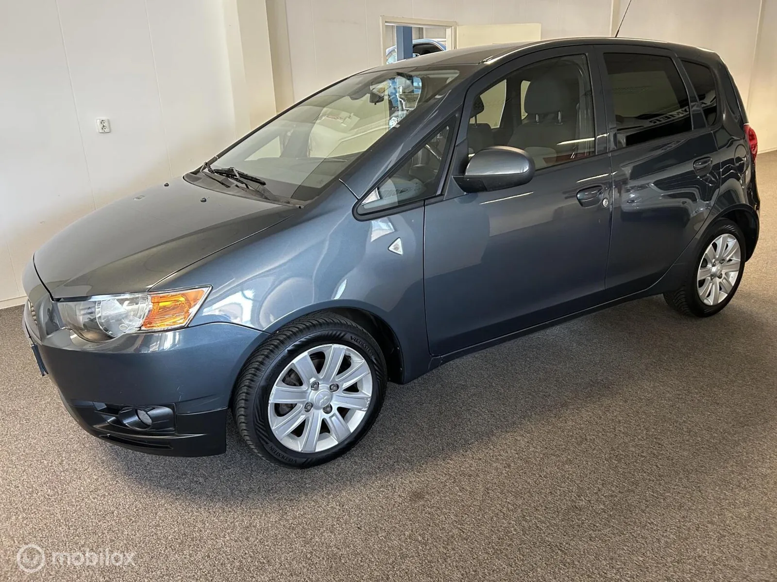 Mitsubishi Colt (2013) — foto 1