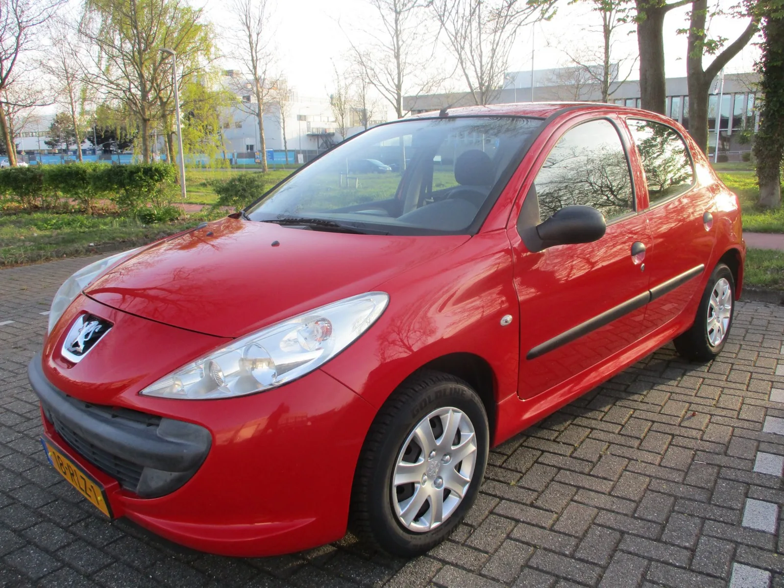 Peugeot 206 (2011) — foto 1