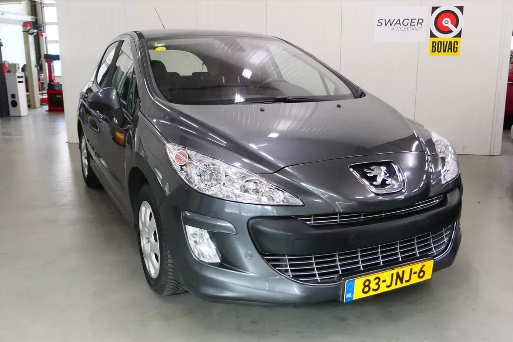 Peugeot 308 (2009) — foto 1