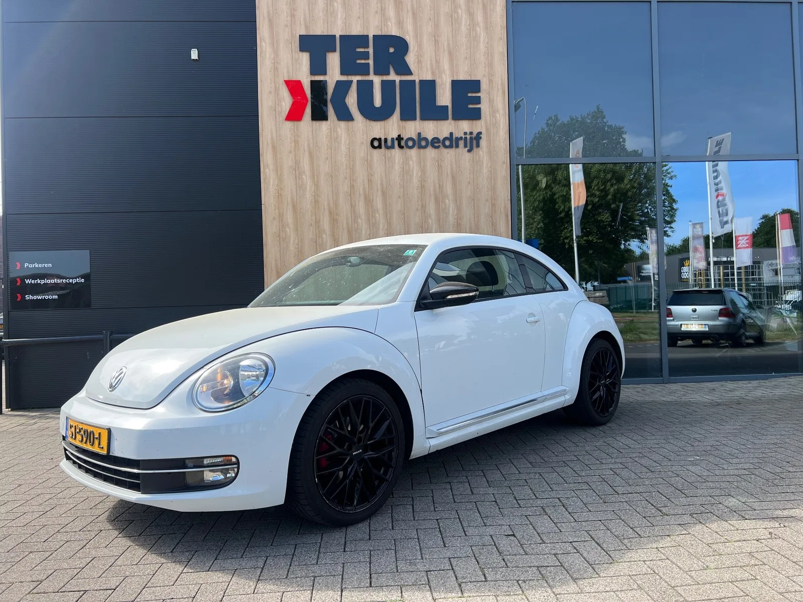 Volkswagen Beetle (2011) — foto 1