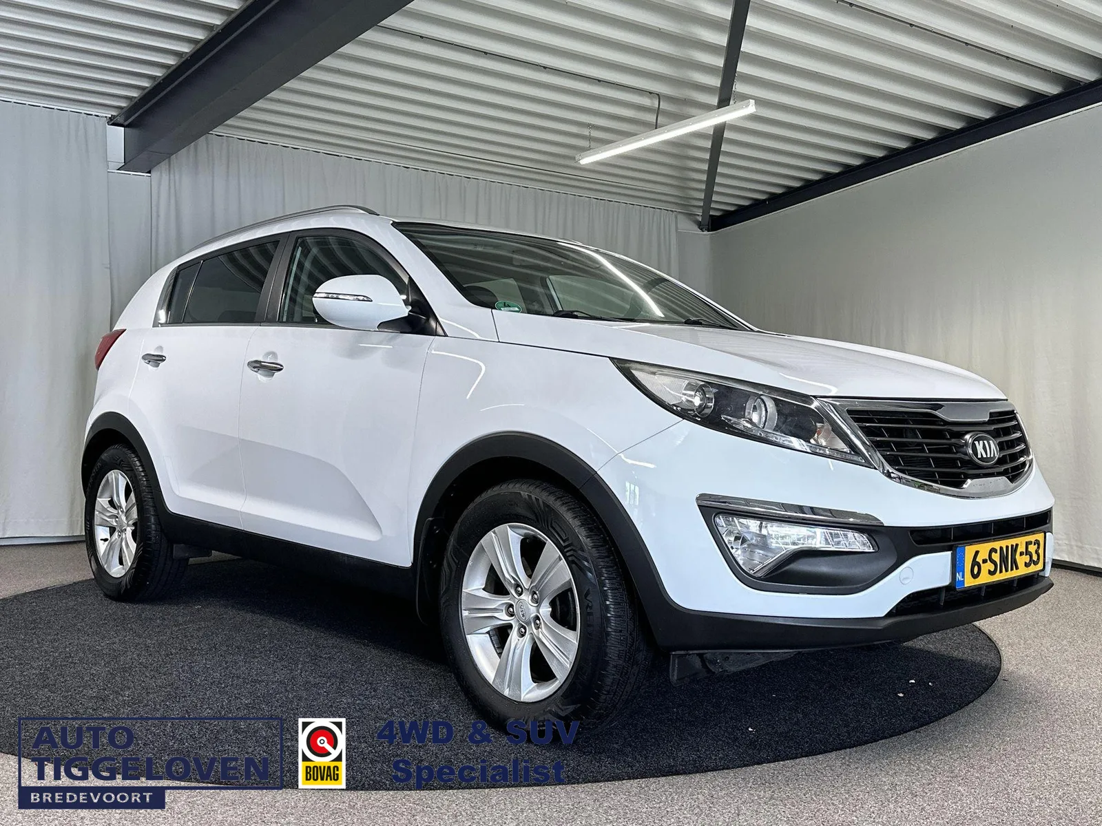 Kia Sportage (2013) — foto 1
