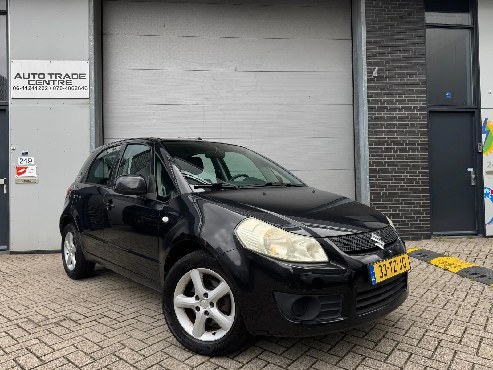 Suzuki SX4 (2007) — foto 1