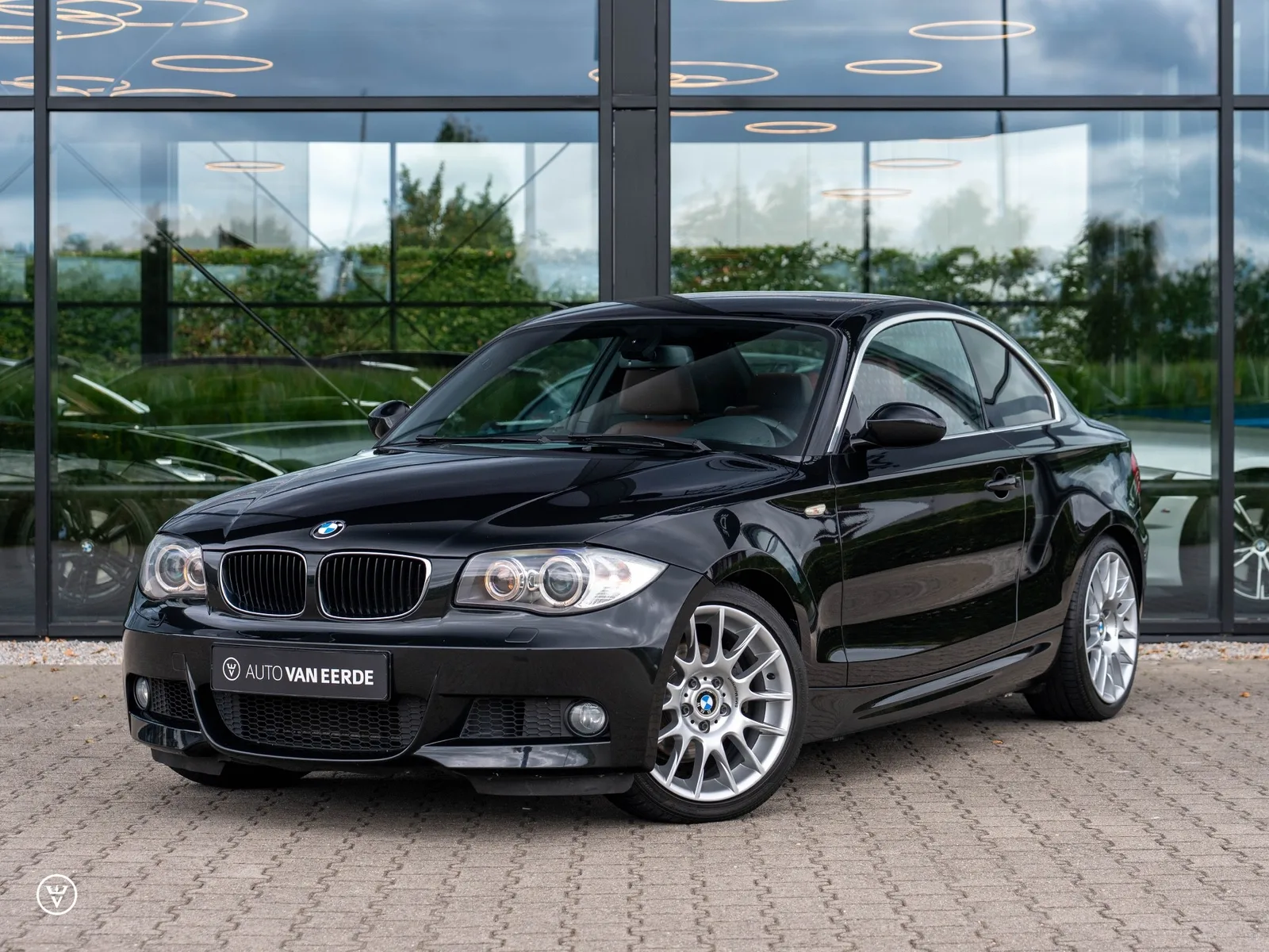 BMW 1-Serie (2009) — foto 1