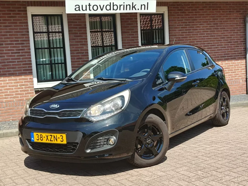 Kia Rio (2013) — foto 1