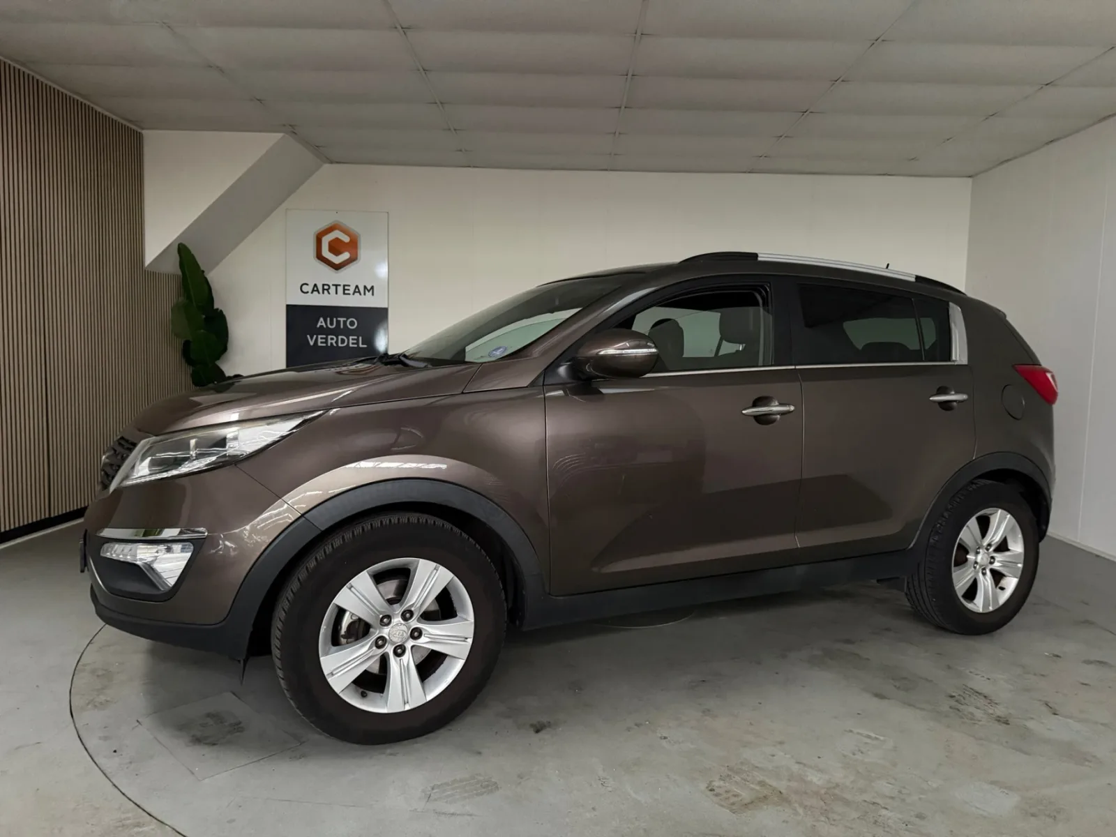 Kia Sportage (2011) — foto 1