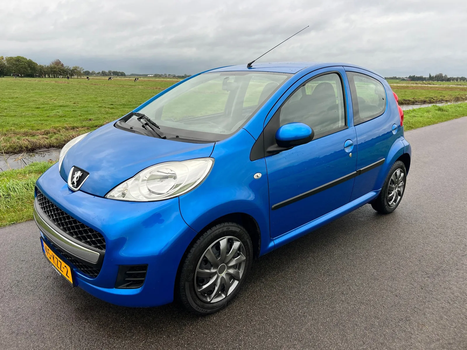 Peugeot 107 (2011) — foto 1
