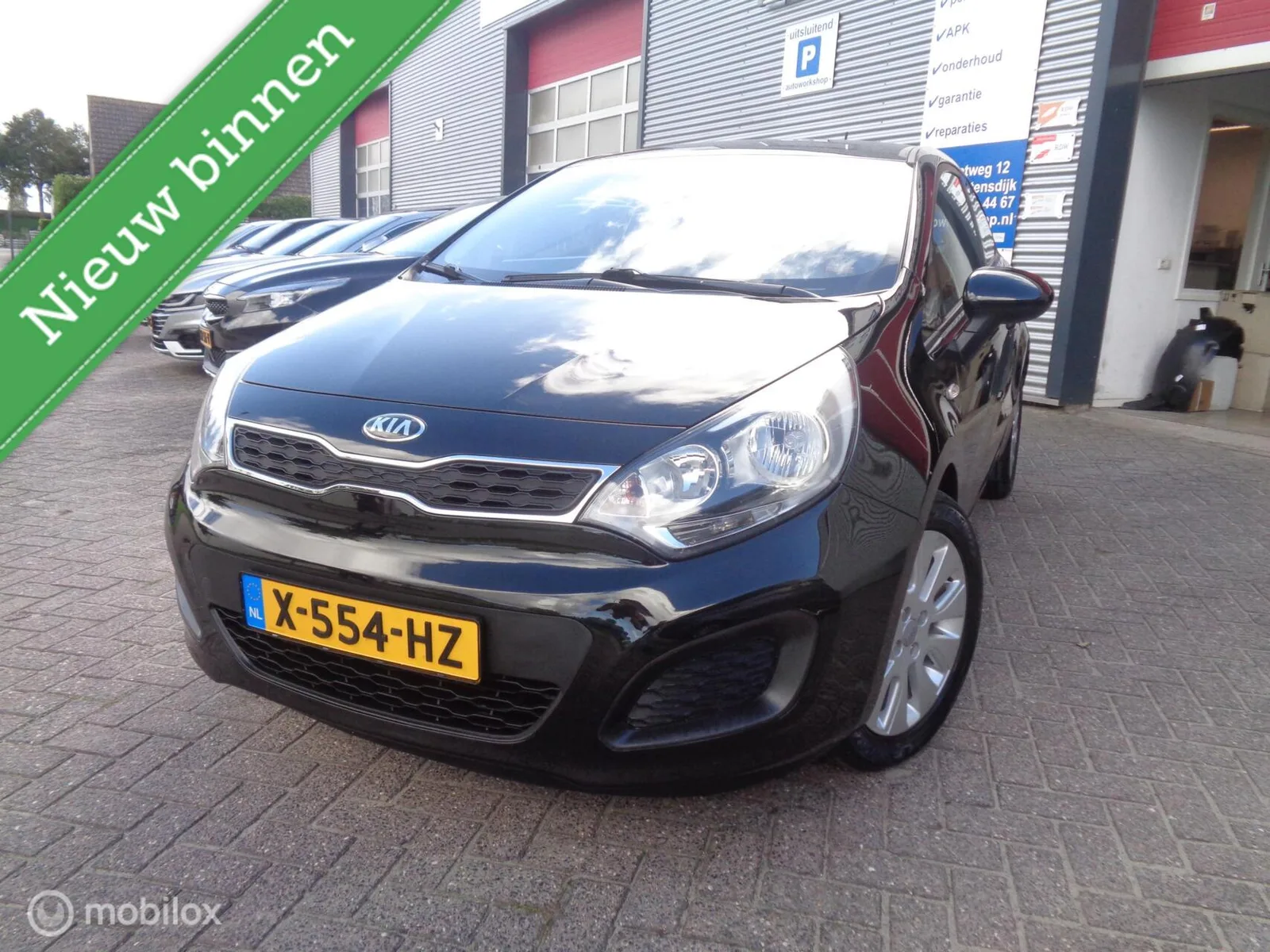 Kia Rio (2012) — foto 1