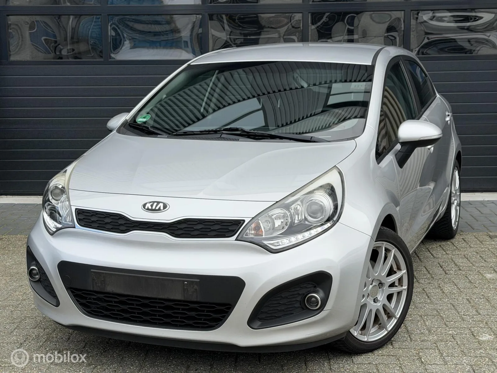 Kia Rio (2013) — foto 1