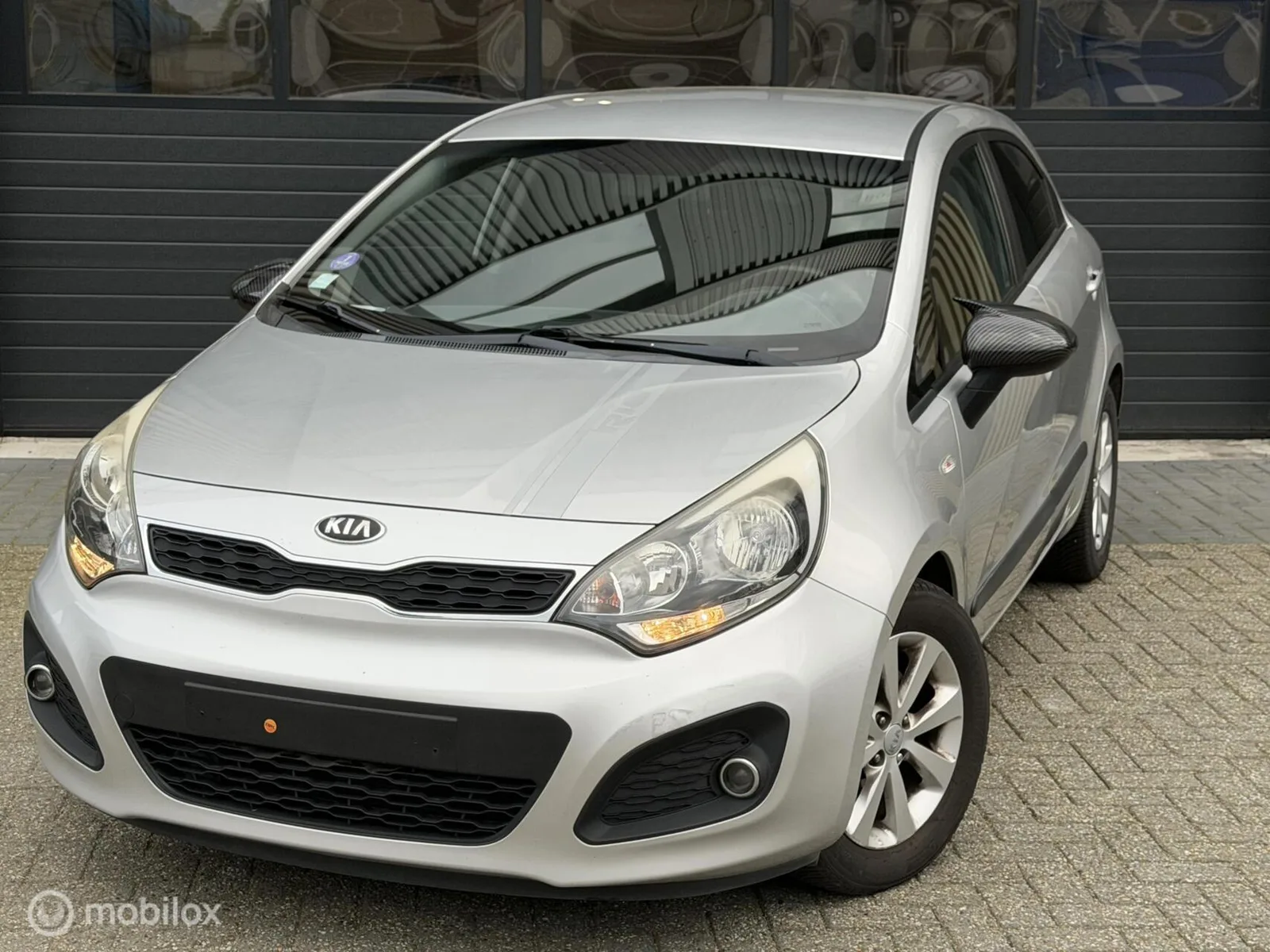 Kia Rio (2013) — foto 1
