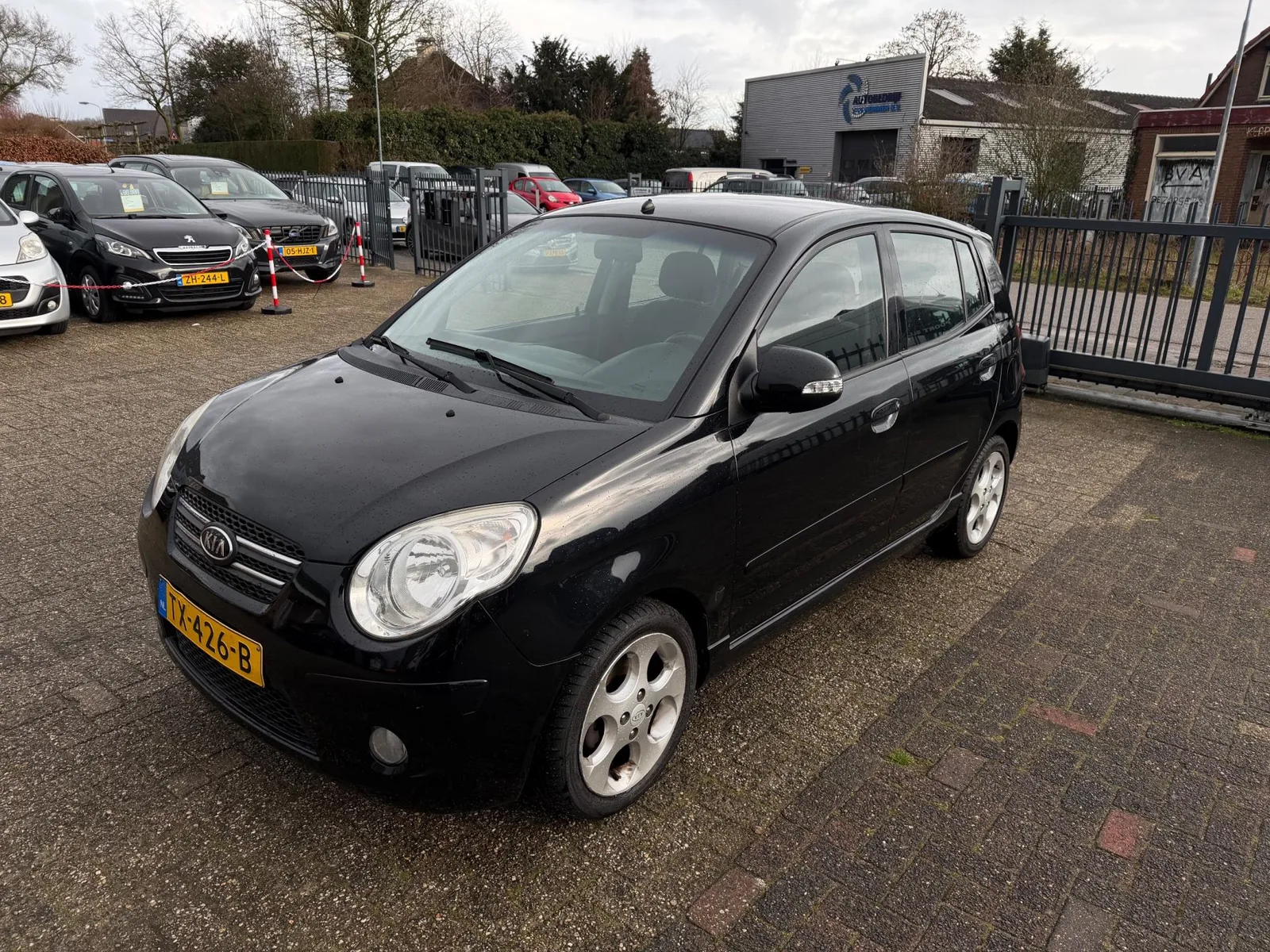 Kia Picanto (2009) — foto 1