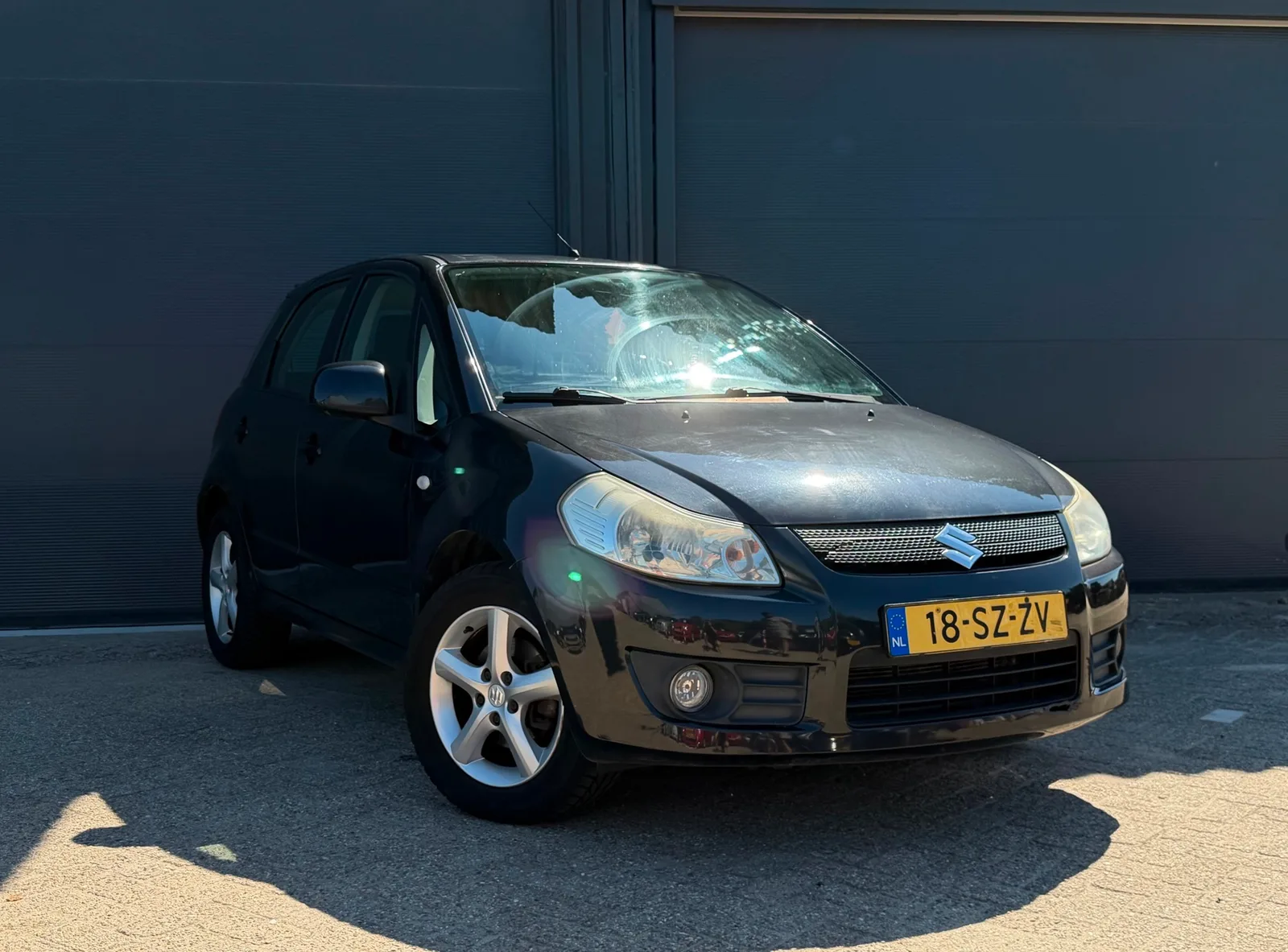 Suzuki SX4 (2006) — foto 1