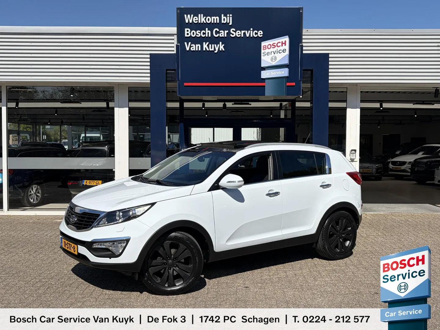 Kia Sportage (2012) — foto 1
