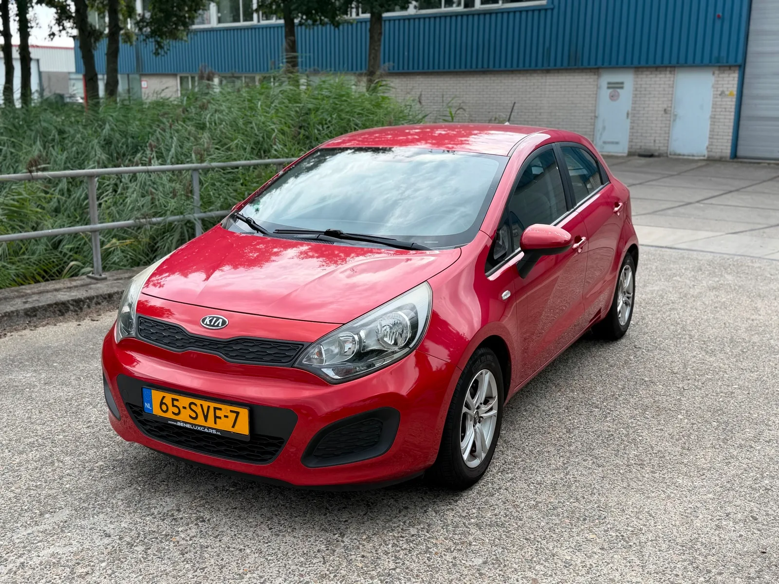 Kia Rio (2011) — foto 1
