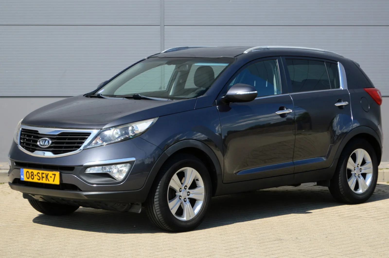 Kia Sportage (2011) — foto 1