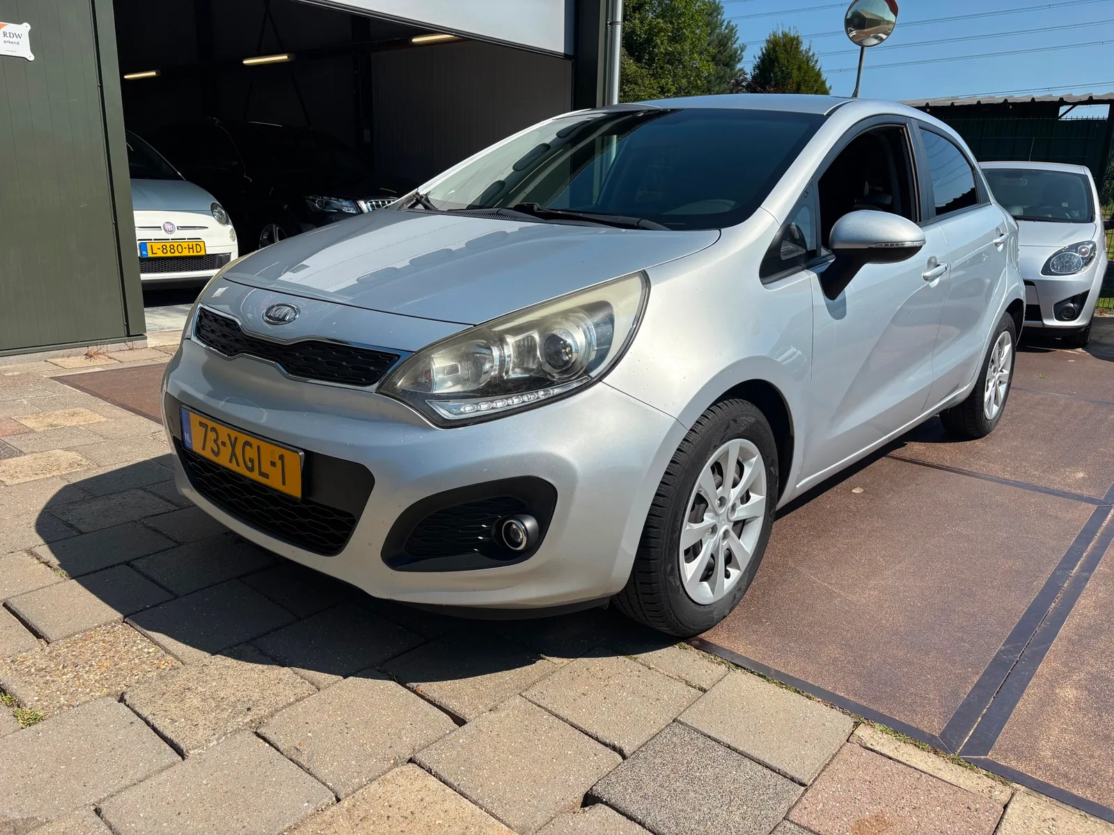 Kia Rio (2012) — foto 1