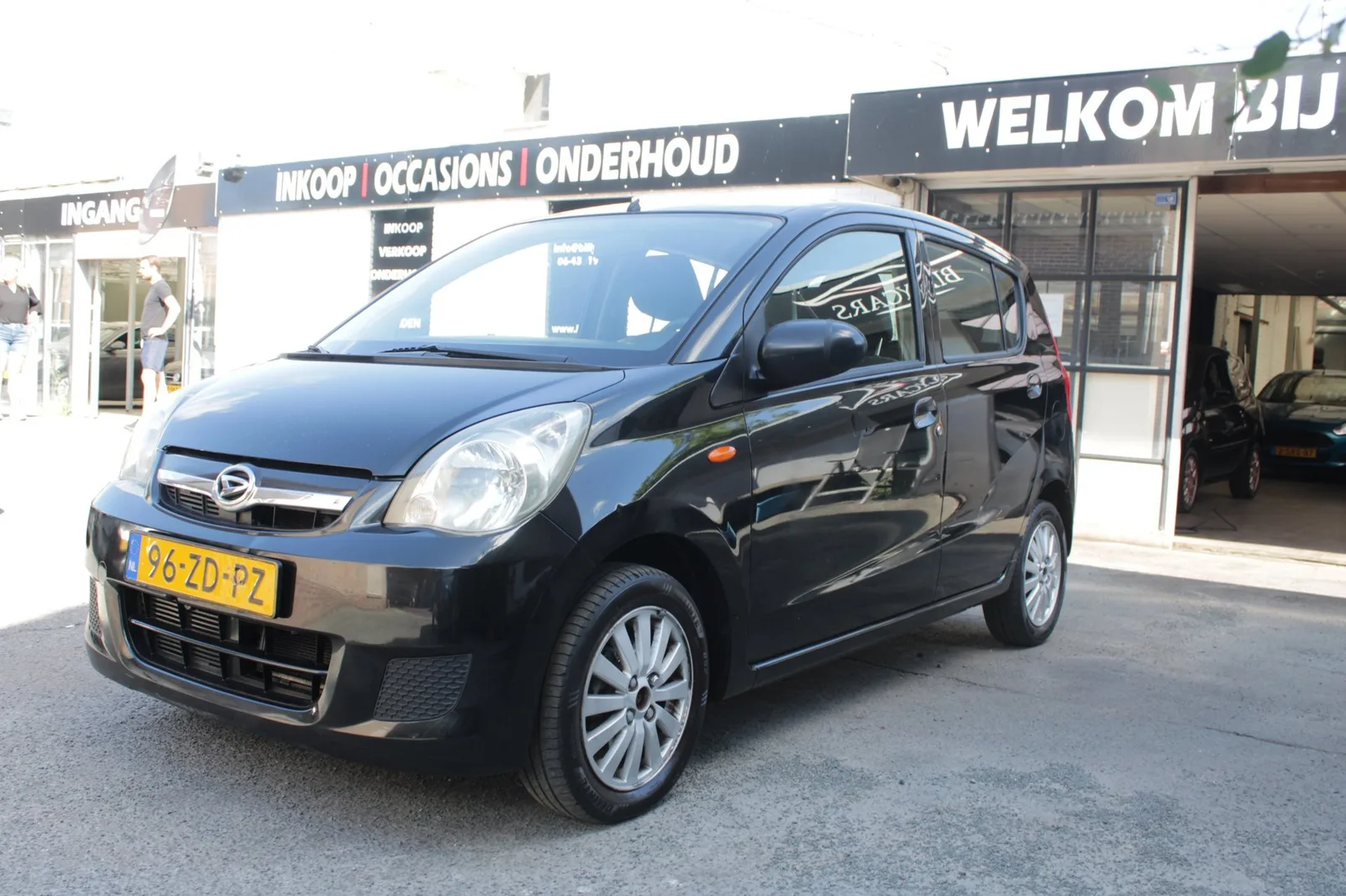 Daihatsu Cuore (2008) — foto 1