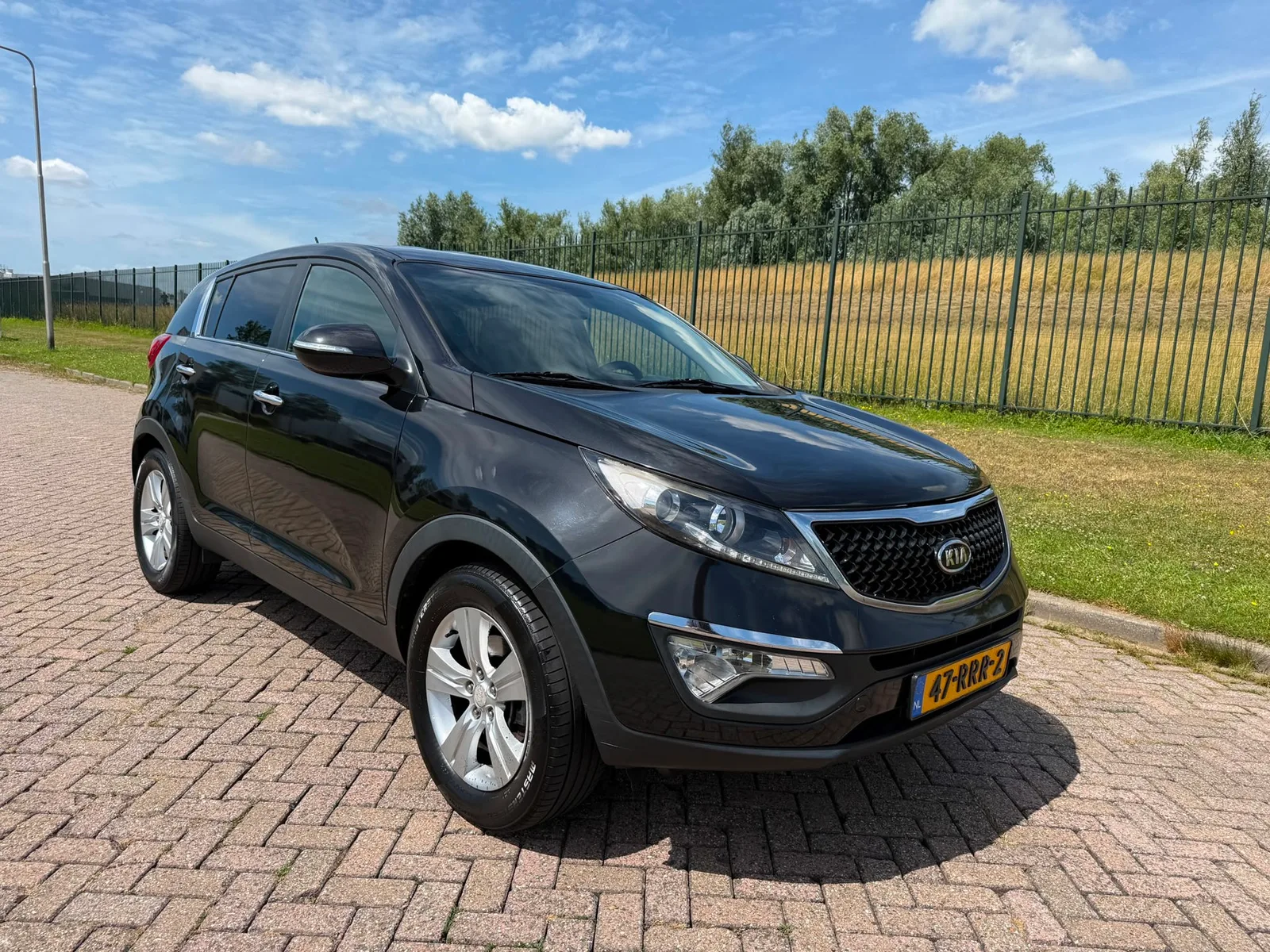 Kia Sportage (2011) — foto 1