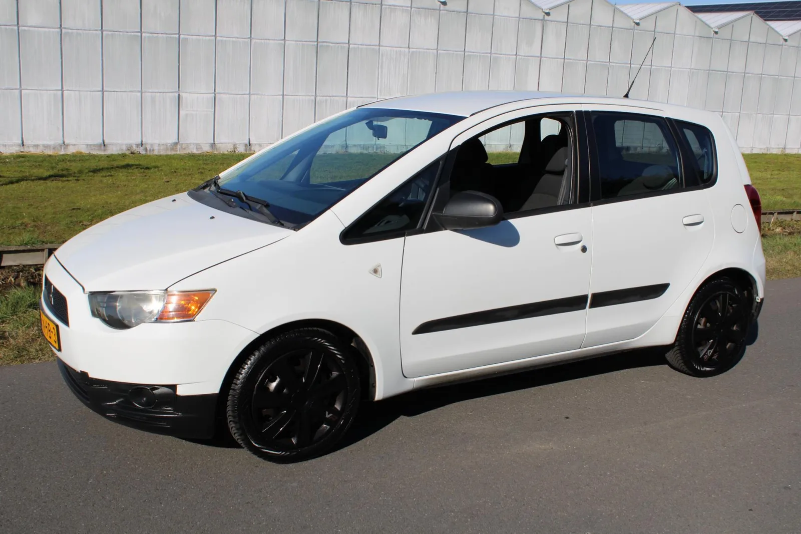 Mitsubishi Colt (2010) — foto 1
