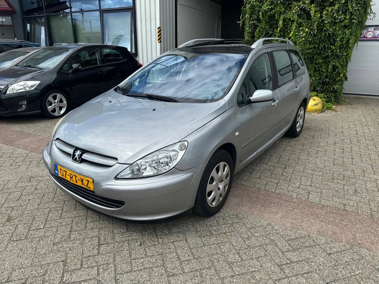 Peugeot 307 SW (2005) — foto 1