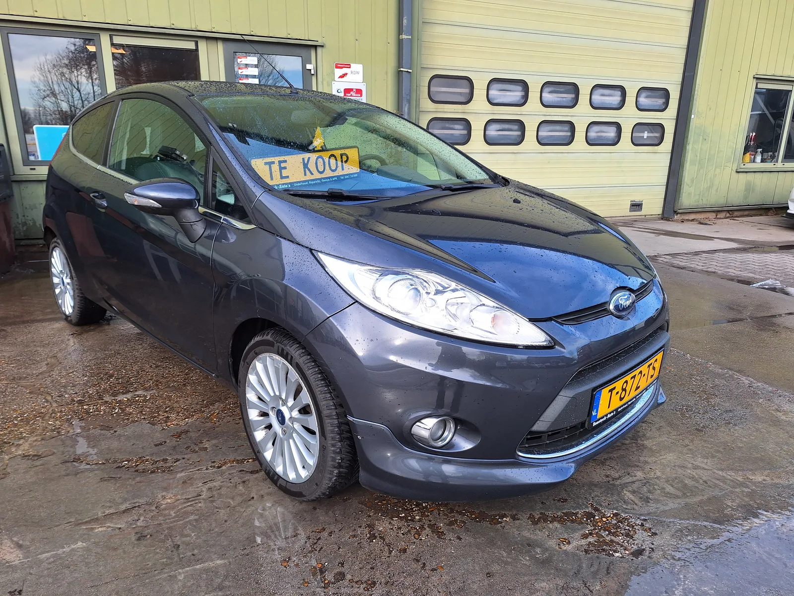 Ford 1.4 Ghia (2009) — foto 1