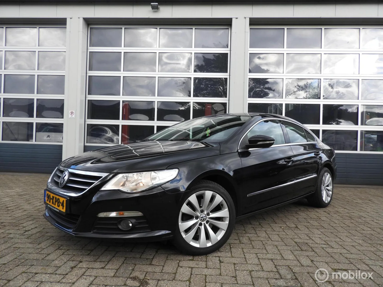 Volkswagen Passat (2010) — foto 1