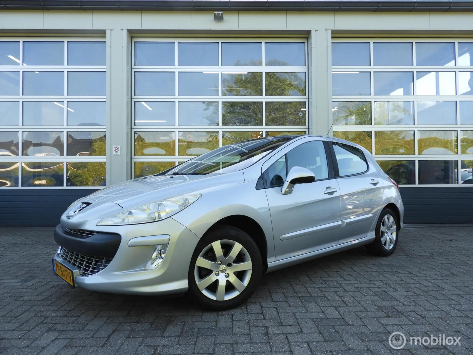 Peugeot 308 (2009) — foto 1