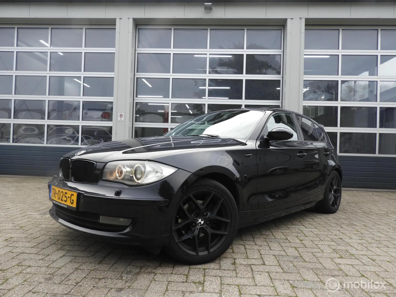 BMW 1-Serie (2009) — foto 1