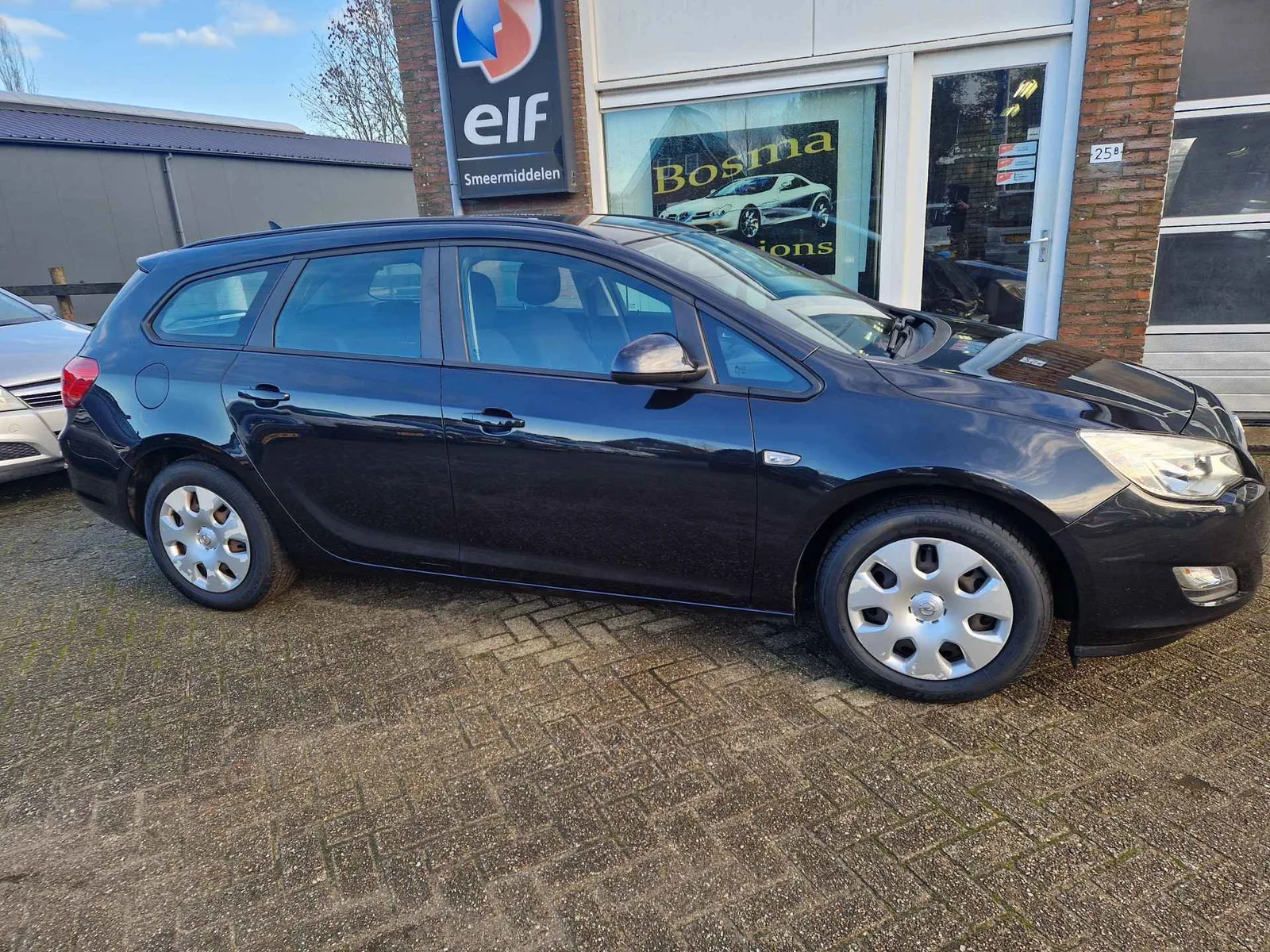 Opel Astra (2012) — foto 1