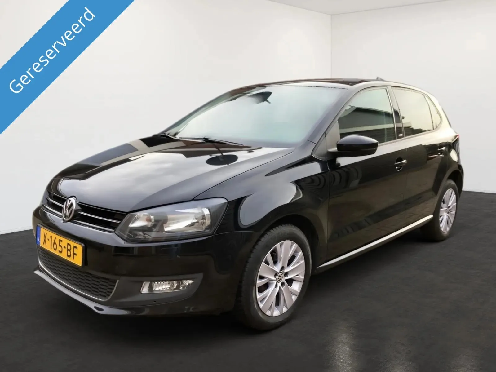 Volkswagen Polo (2011) — foto 1