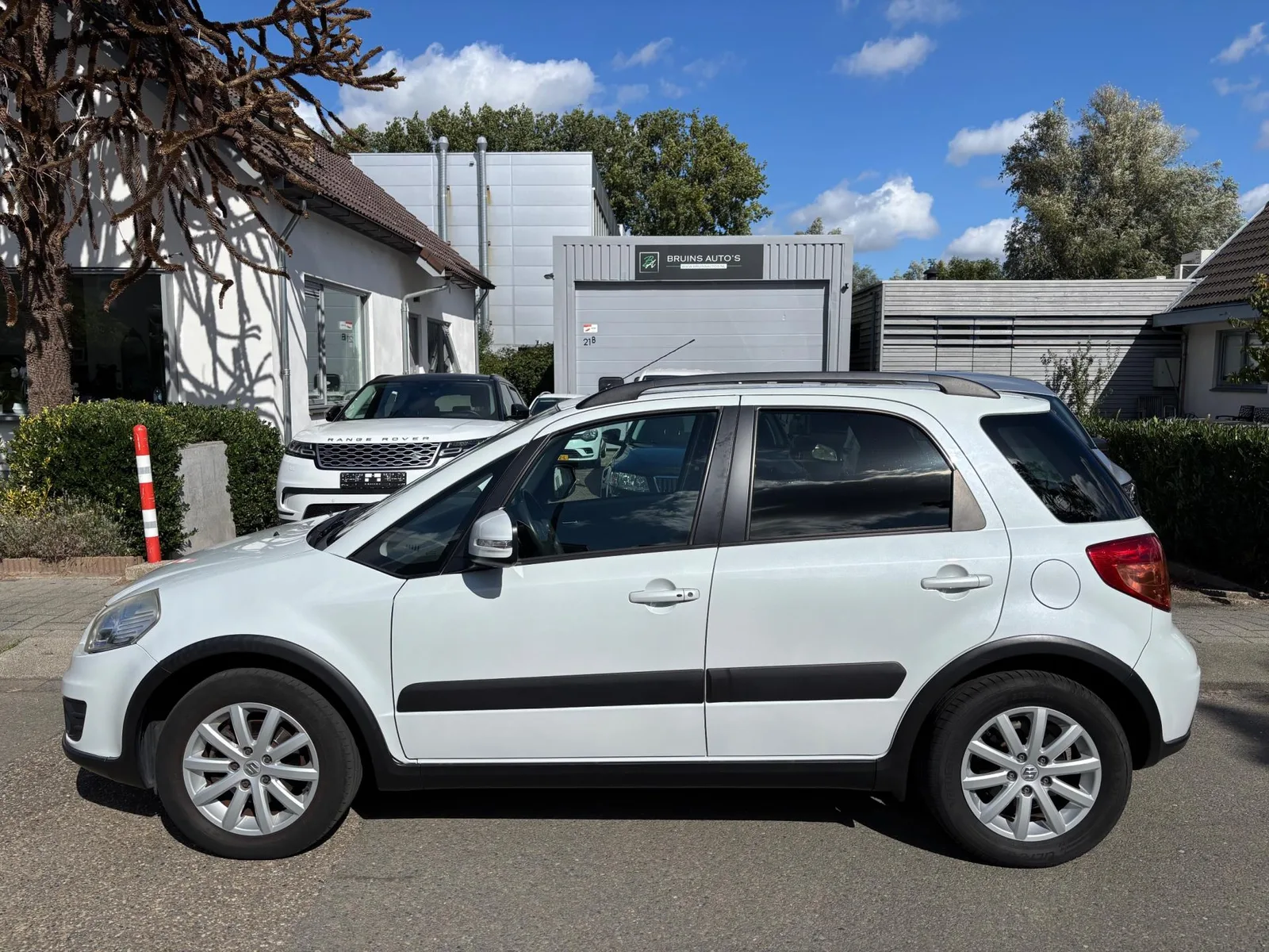 Suzuki SX4 (2013) — foto 1