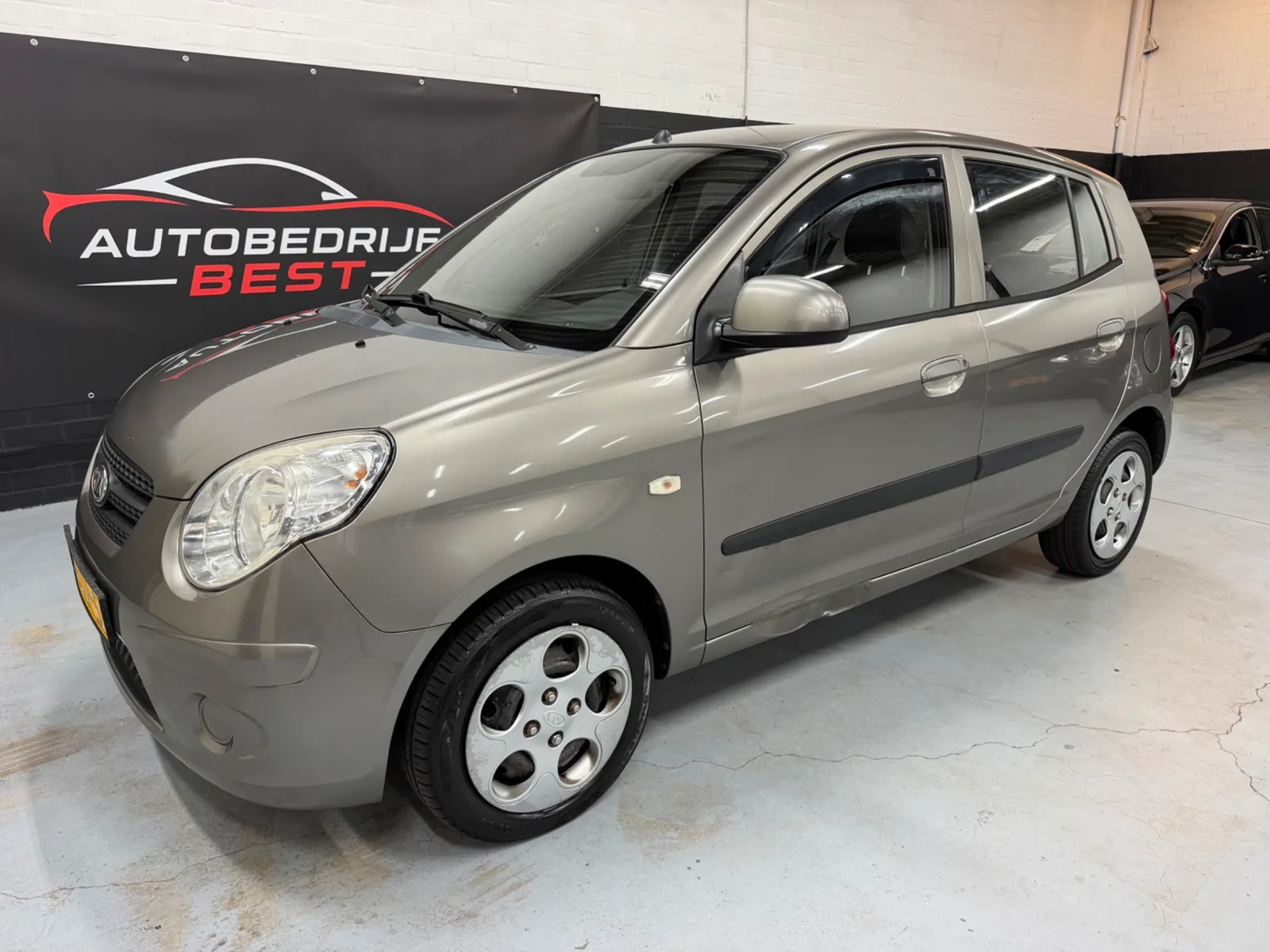 Kia Picanto (2010) — foto 1