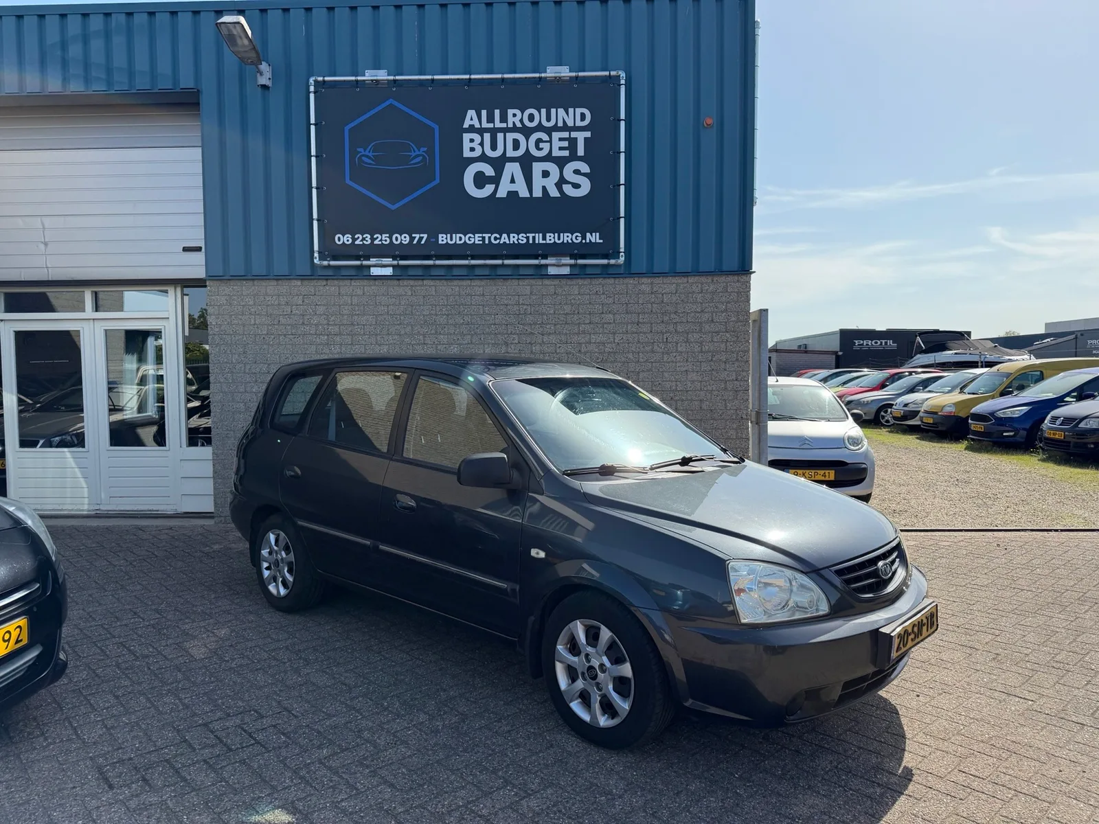 Kia Carens (2006) — foto 1