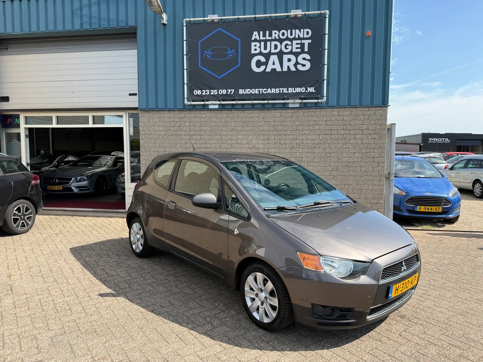 Mitsubishi Colt (2011) — foto 1
