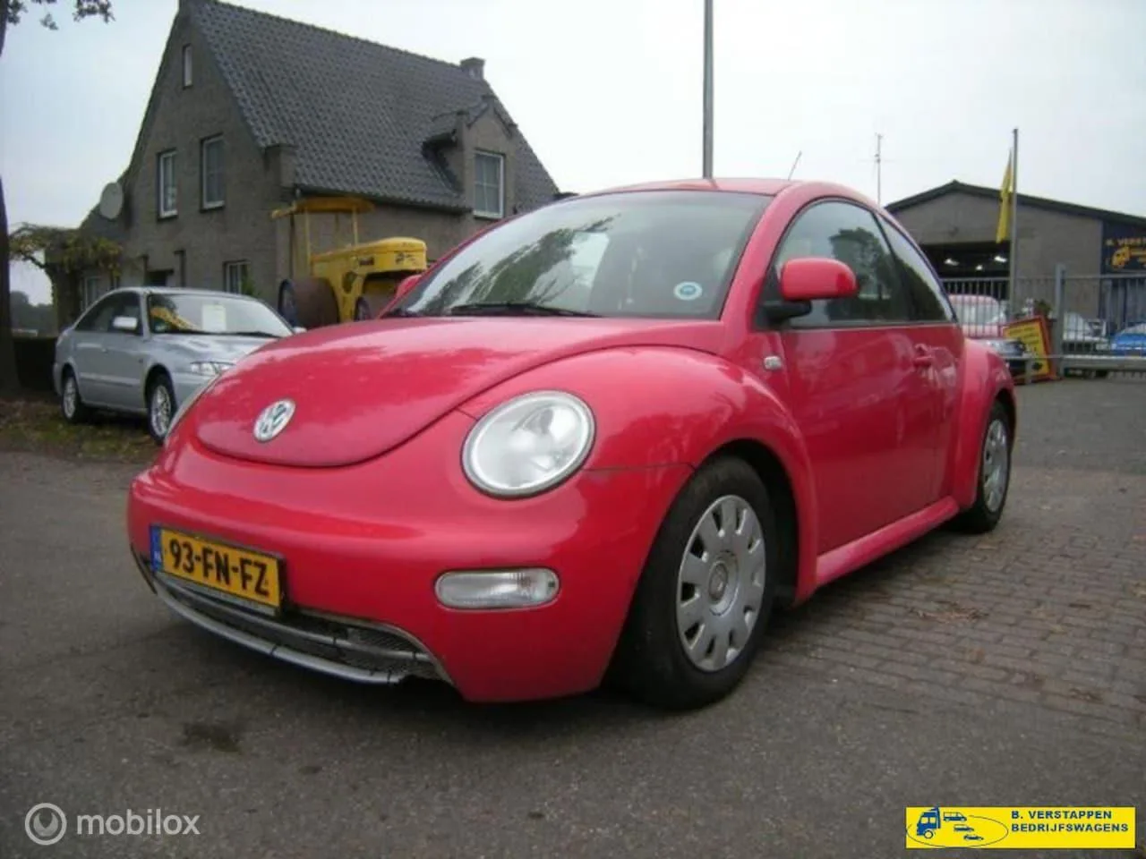 Volkswagen New Beetle (2000) — foto 1